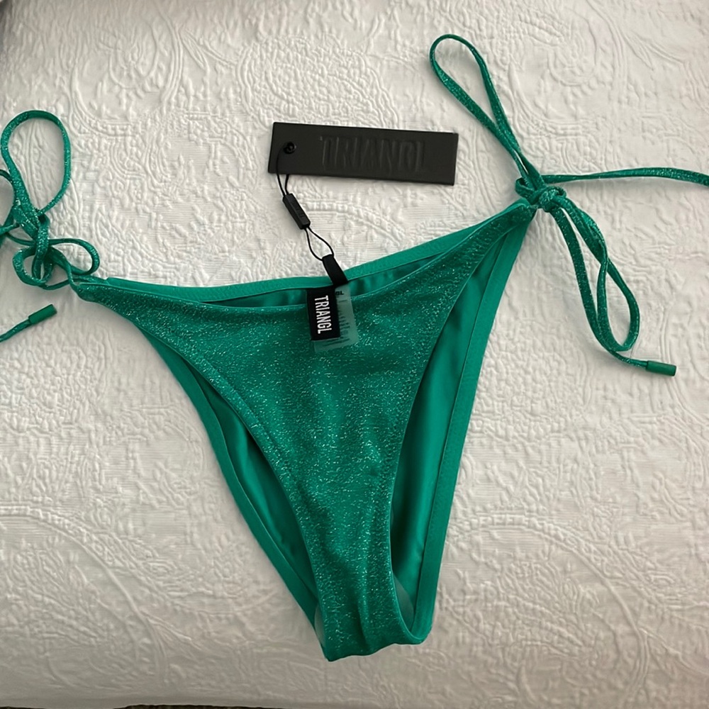 TRAINGL BOTTOMS. NEW WITH TAGS !!! JADE GREEN. size small. $50 or BEST OFFER